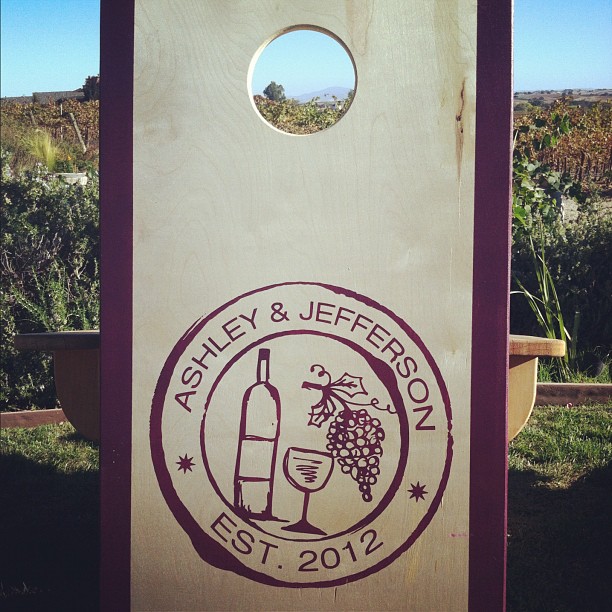 Loving our new Cornhole decks that were custom made for our winery wedding!